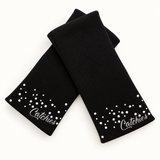 Black Competition Catchies wristbands in crossed arrangement on ivory background