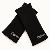 black Catchies wristbands crossed on ivory background