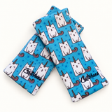Caticorn Catchies Bands wristbands in crossed arrangement on ivory background