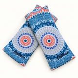 Flipping Full-Circle — Limited Edition wristbands in crossed arrangement on ivory background