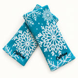 Frozen Flakes Catchies wristbands in crossed arrangement on ivory background