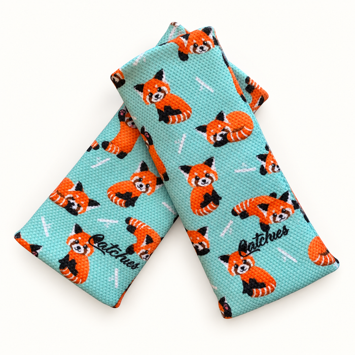 Press PandaStands wristbands in crossed arrangement on ivory background