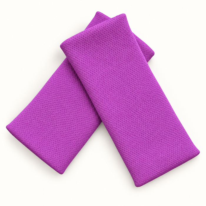 Pretty Purple wristbands in crossed arrangement on ivory background