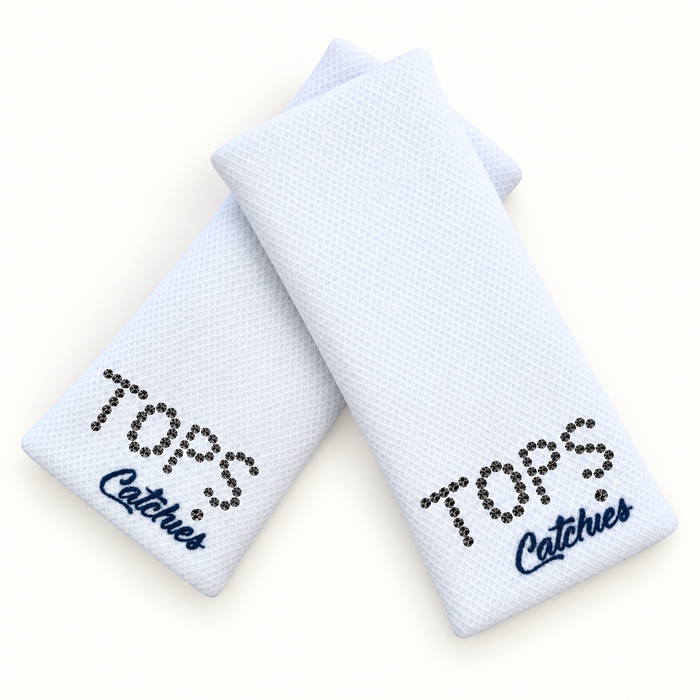 TOPS Catchies wristbands in crossed arrangement on ivory background