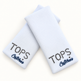 TOPS Catchies wristbands in crossed arrangement on ivory background